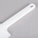 An Ateco baking / icing spatula with a white plastic handle.