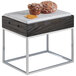 A Cal-Mil Cinderwood marble riser with a table holding two muffins.