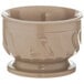 A beige Dinex Turnbury insulated bowl with a pedestal base.