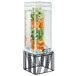A Cal-Mil black metal and glass beverage dispenser with fruit-infused water in it.