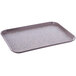 A Dinex Glasteel rectangular tray with a gray and white speckled non-skid surface.