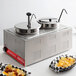 An Avantco countertop food warmer with two pots on top filled with food.