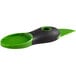 An OXO Good Grips 3-in-1 Avocado Slicer and Pitter with a green handle and black blade.