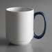 A white porcelain mug with blue stripes and a blue handle.