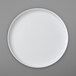 A Villeroy & Boch white round porcelain platter on a gray surface.