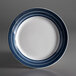 A white porcelain plate with blue stripes.