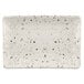 A white rectangular Elite Global Solutions melamine plate with black speckled spots.