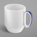 A white Schonwald Donna Senior porcelain mug with a dark blue handle.