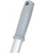 A close-up of a grey Unger SmartColor telescoping mop handle with a white plastic grip.