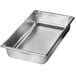 A Vollrath stainless steel hotel pan on a counter.