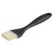 An OXO Good Grips silicone bristle pastry/basting brush with a white handle.