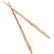 A pair of Town 9" Teak Wood Chopsticks.