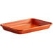 A Baker's Mark orange non-stick rectangular tray with a wire in rim.