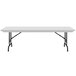 A white rectangular Correll folding table with black legs.