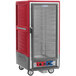 A red and silver Metro C5 heated holding and proofing cabinet with a clear door.