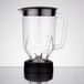 A clear polycarbonate Waring blender jar with a black lid.