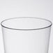 A close up of a Fineline tall clear plastic tumbler.
