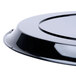A black plastic WNA Comet round catering tray lid.