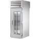 A True Spec Series stainless steel roll-in refrigerator with a glass door.