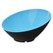 A blue melamine bowl with a black slanted rim.
