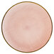 A pink plate with a gold border.