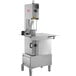 An Avantco stainless steel floor model vertical meat saw with a rectangular surface.
