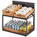 A Tablecraft two tier wooden crate display shelf with food and drinks.