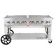 A large stainless steel Crown Verity gas grill with wheels.