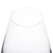 An Arcoroc wine glass with a white background.