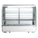 A white Avantco refrigerated countertop bakery display case with shelves inside.