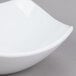 An American Metalcraft square stoneware bowl on a gray surface.
