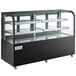 An Avantco black curved glass dry bakery display case with glass shelves.