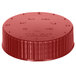 A red plastic Vollrath Dripcut lid with writing on it.