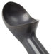 A close-up of a black plastic Zeroll ice cream scoop with a handle.