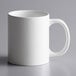 An Acopa bright white stoneware mug with a white handle.