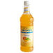 A close up of a Monin Sugar Free Mango Flavoring Syrup bottle.