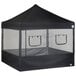 A black E-Z Up food booth tent with mesh panels.