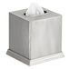 A Focus Hospitality brushed stainless steel square tissue box cover holding white tissues on a counter.