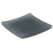 A grey matte resin square soap dish with a curved edge.