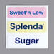 A white sticker with text reading "Sweet in low sugar" on a Server InSweeten Triple Coffee Sweetener Dispenser Station.