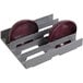 A grey plastic Cambro Camshelving dish rack with a pair of purple plates in a plastic holder.