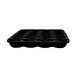 A black foam tray with wavy sections.