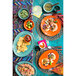A table set with colorful Tuxton Island Blue gala mugs, bowls, and plates of Mexican food and drinks.