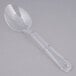 A Thunder Group clear polycarbonate salad bar spoon with a handle.