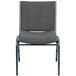 A gray Flash Furniture stack chair with a metal frame and gray fabric.