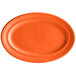 A white oval china platter with an orange rim.