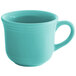 A blue china cup with a handle.