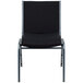 A black and grey Flash Furniture Hercules series stack chair with black dot fabric.
