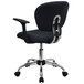 A black office chair with chrome legs.