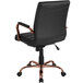 A Flash Furniture black leather office chair with rose gold legs.
